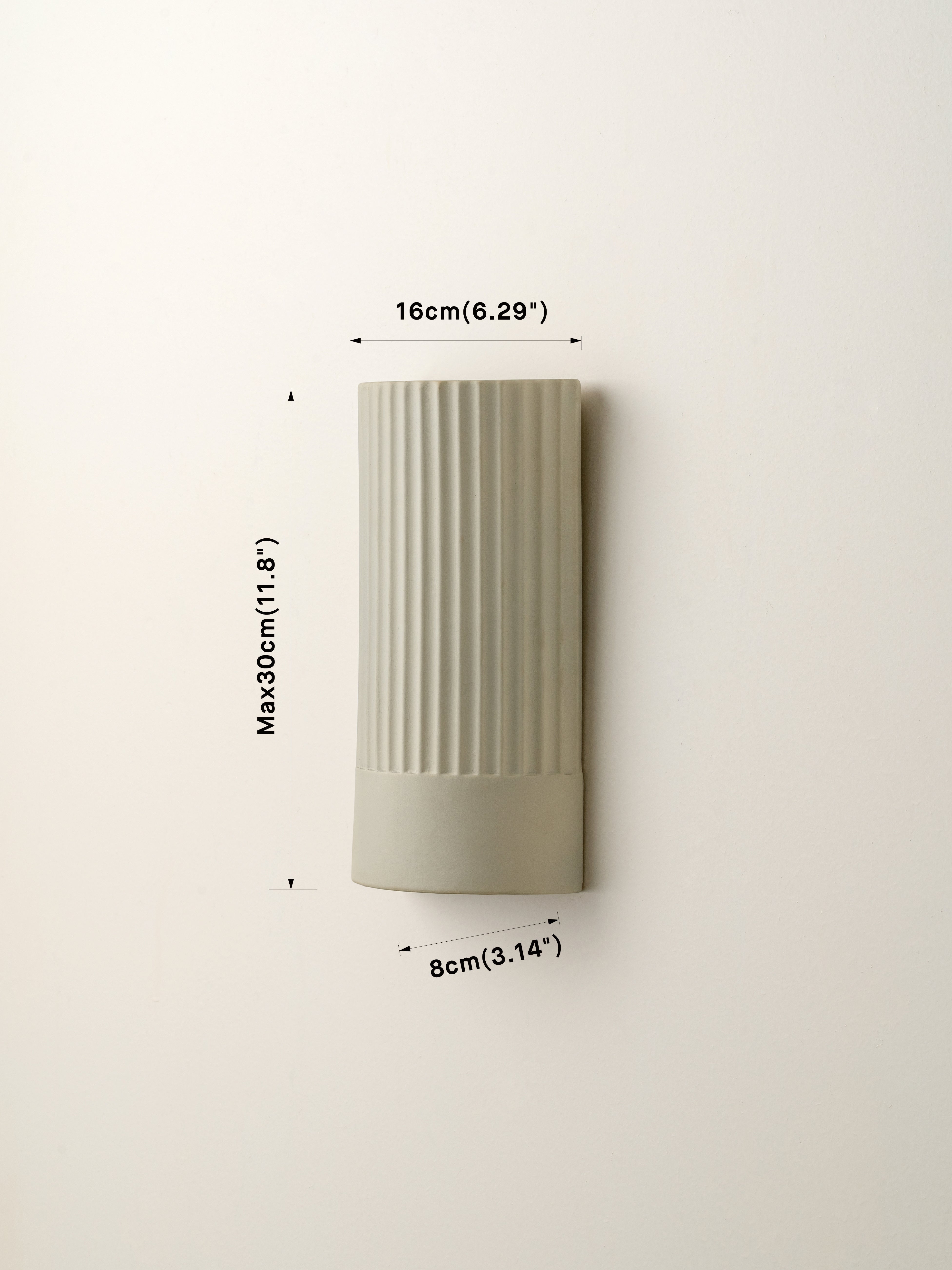 Enza - warm white  ribbed ceramic wall light