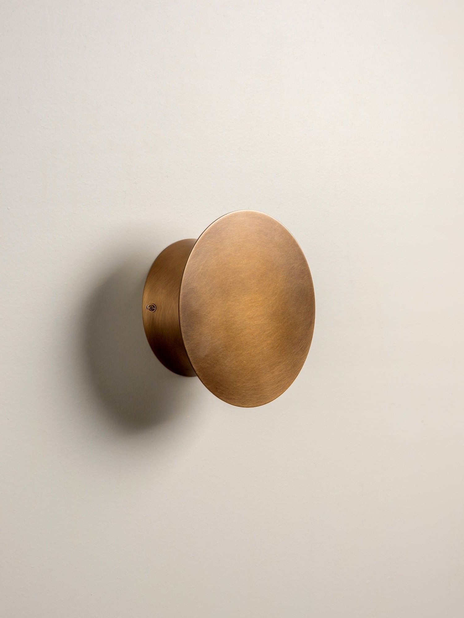 Santi - LED adjustable aged brass disc wall light