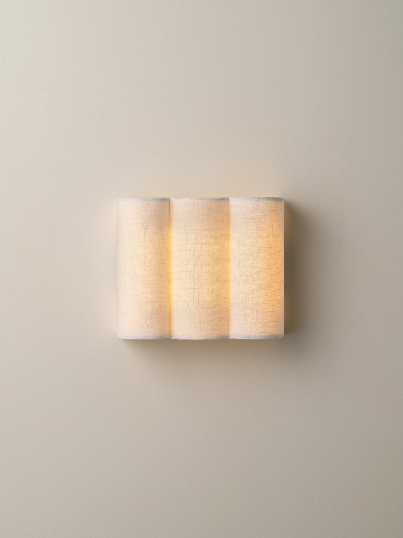 Folia - scalloped natural linen wall light