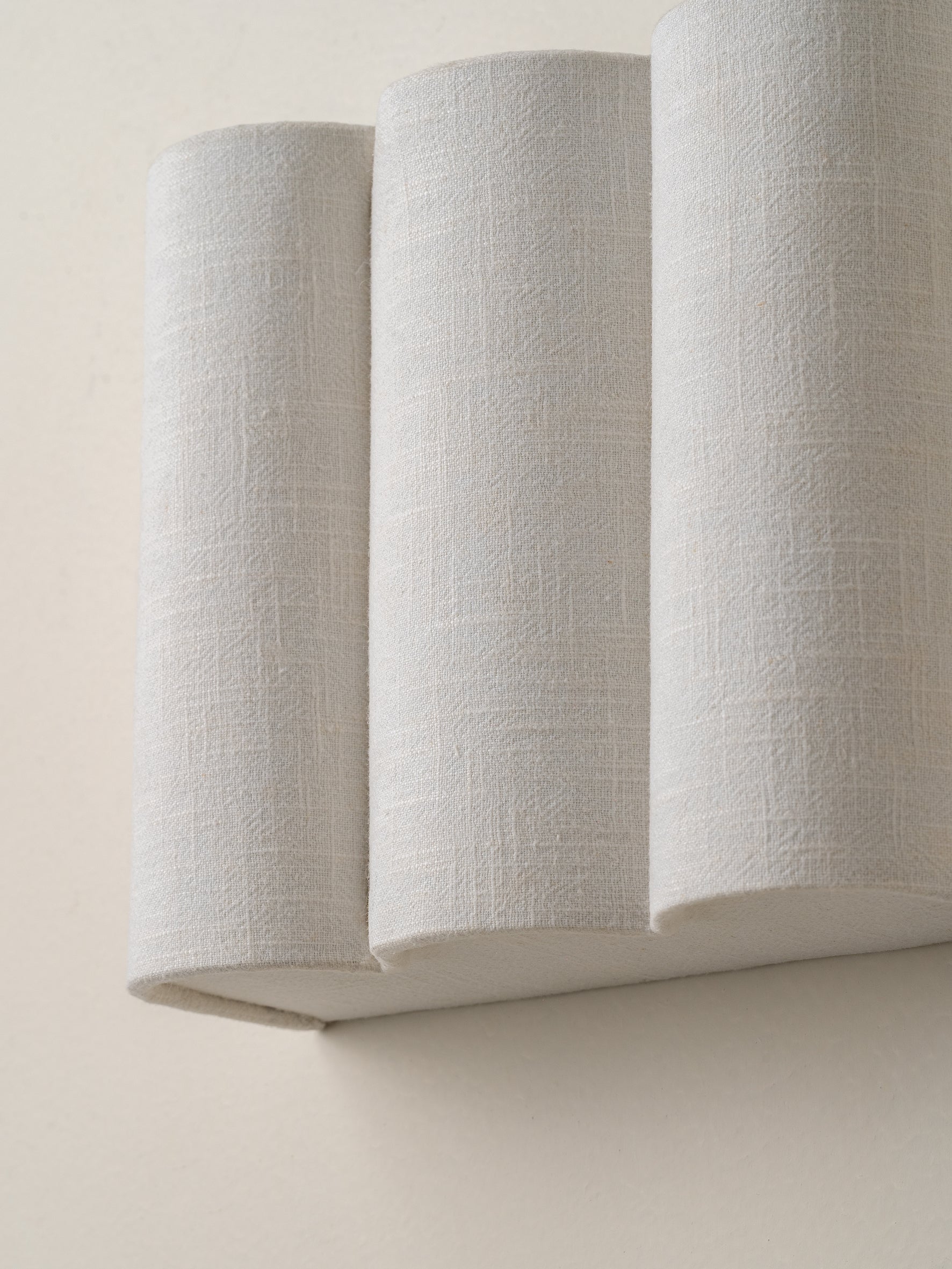 Folia - scalloped natural linen wall light