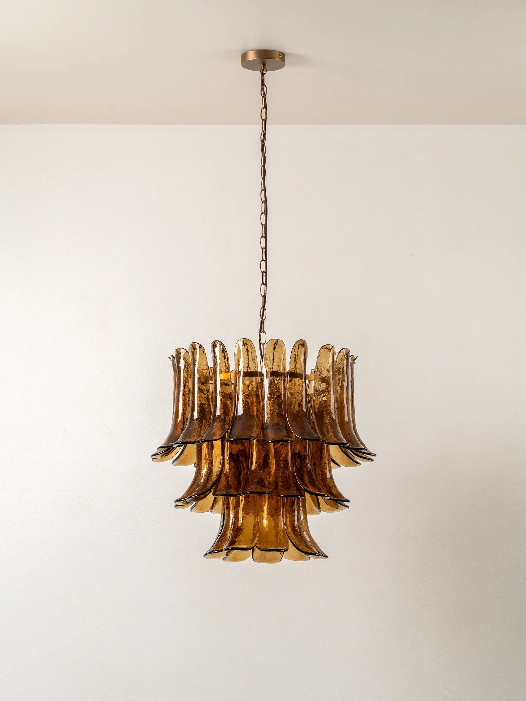 Lonso - 4 light aged brass and smoked brown glass chandelier