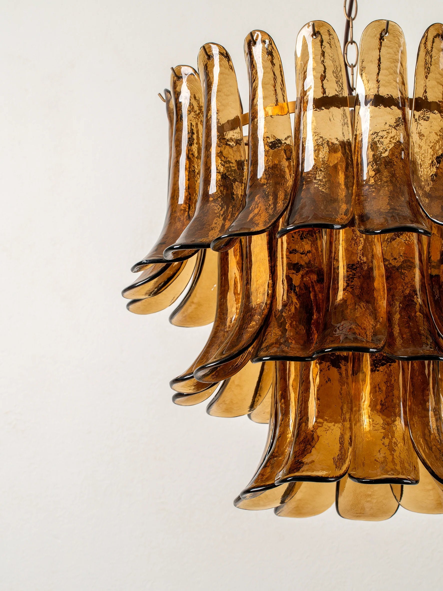 Lonso - 4 light aged brass and smoked brown glass chandelier