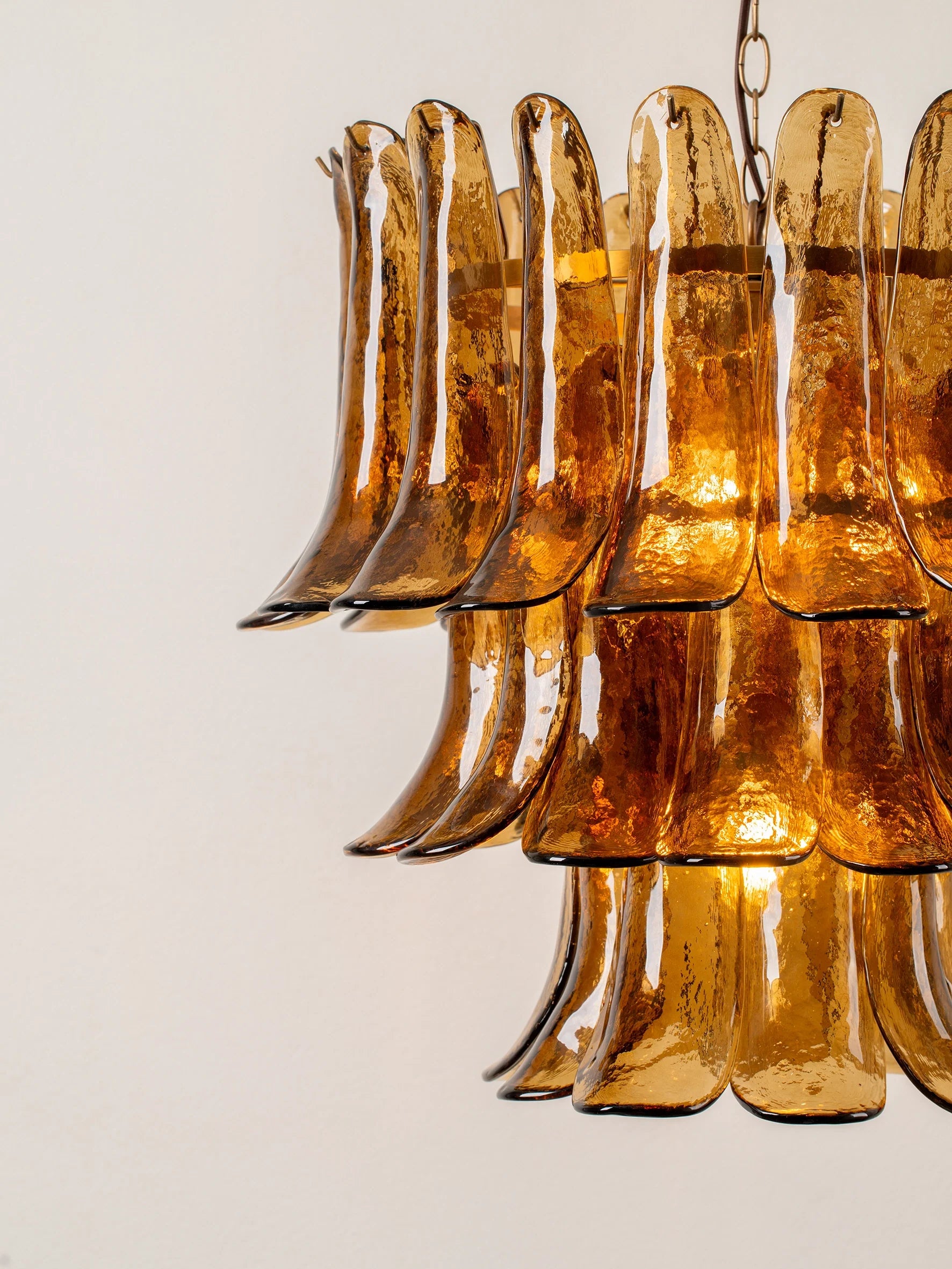 Lonso - 4 light aged brass and smoked brown glass chandelier