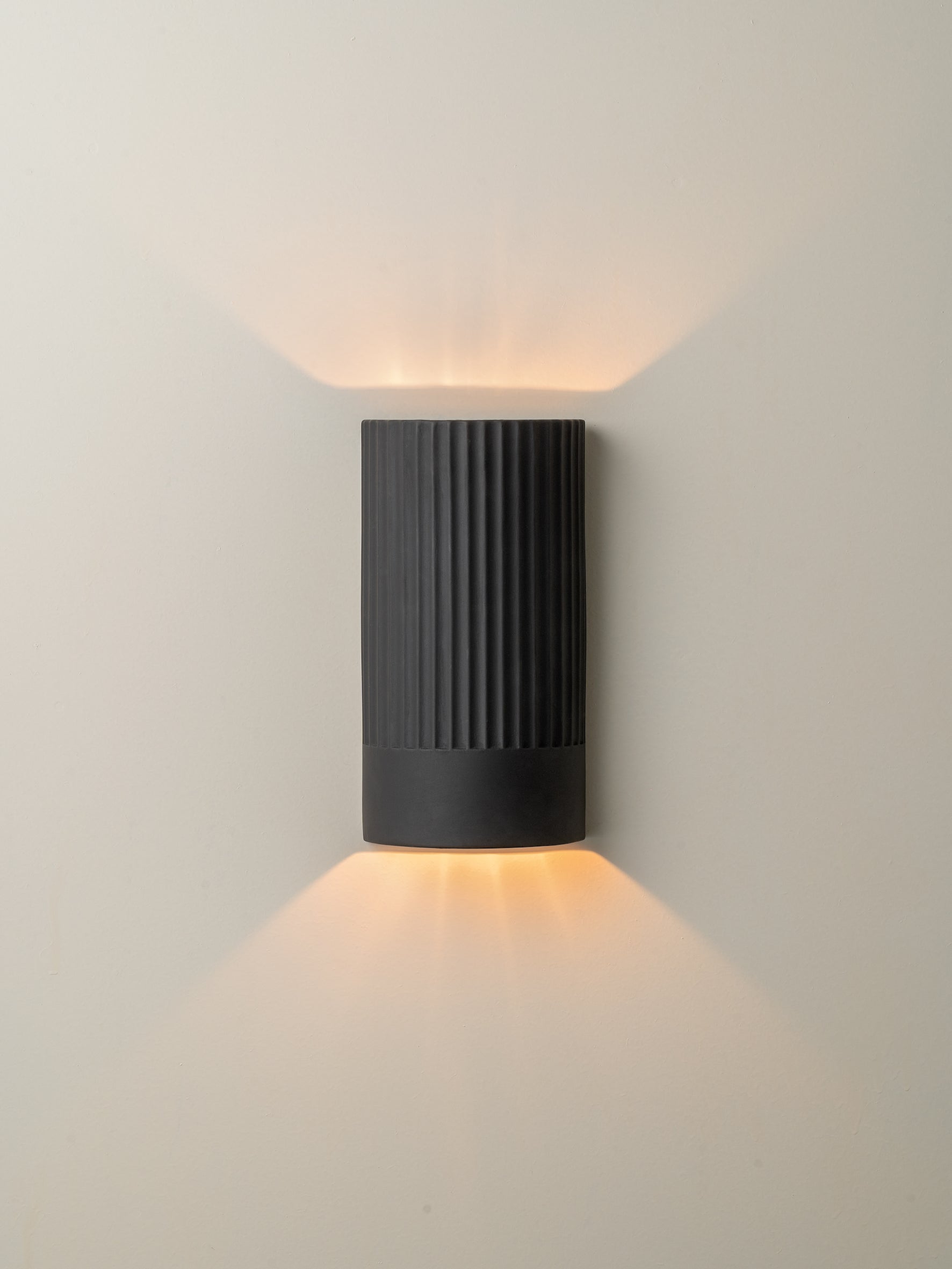 Nitara - chocolate ribbed concrete wall light