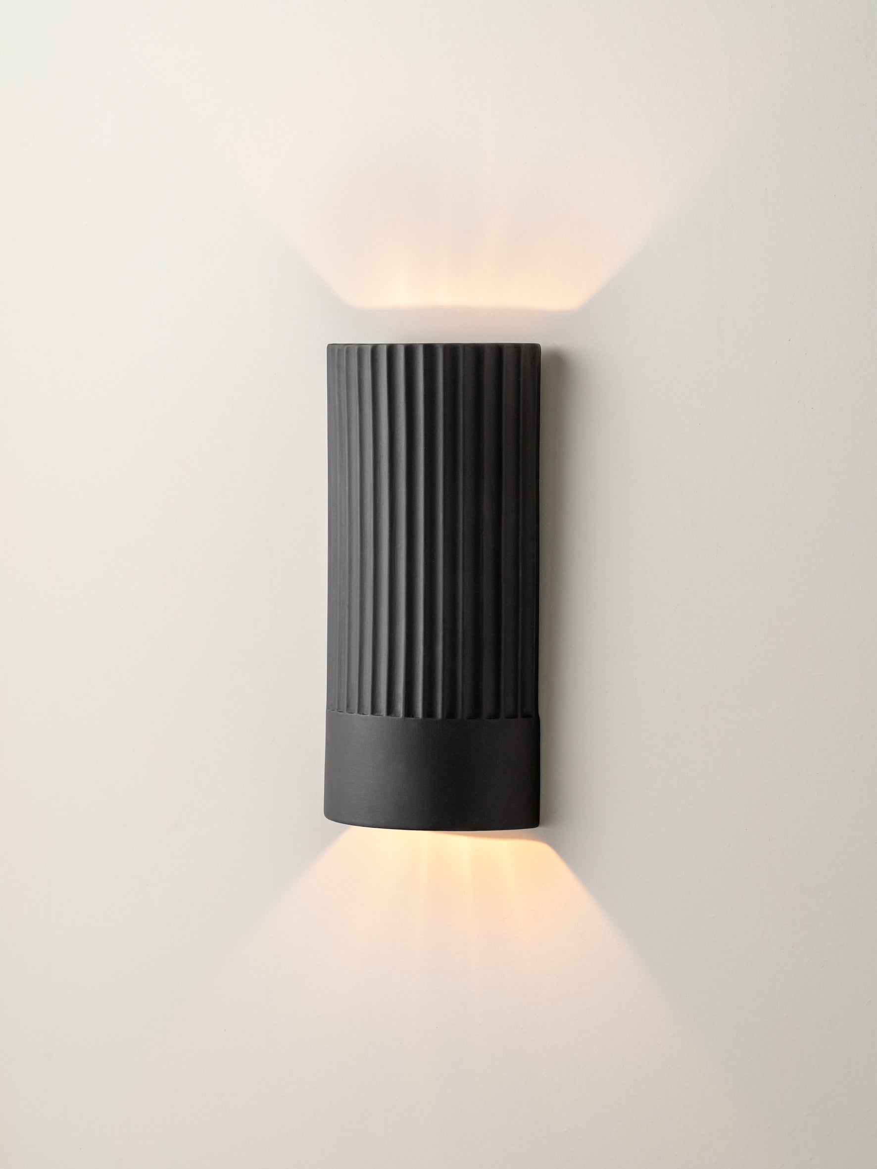 Nitara - chocolate ribbed concrete wall light