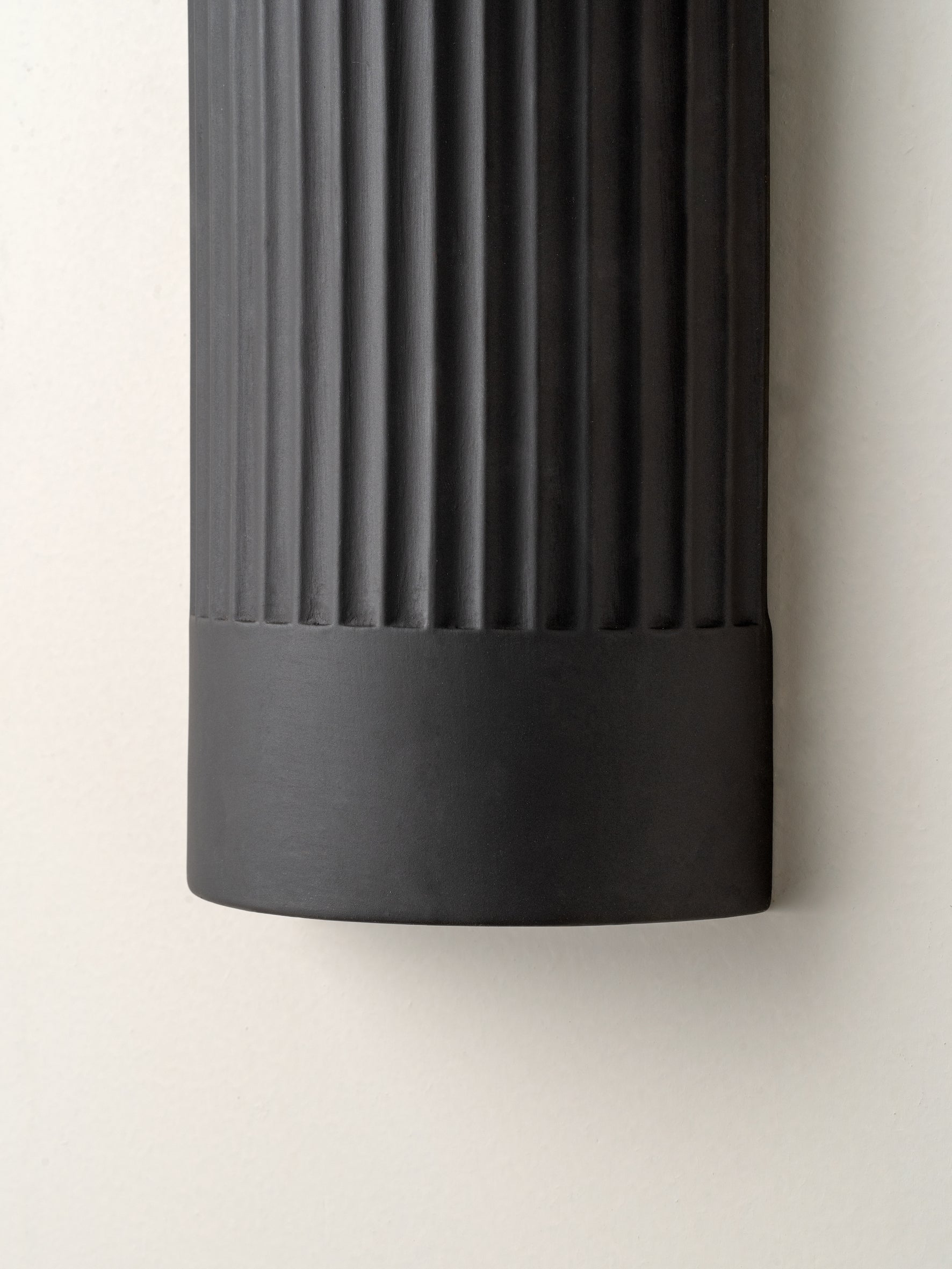 Nitara - chocolate ribbed concrete wall light