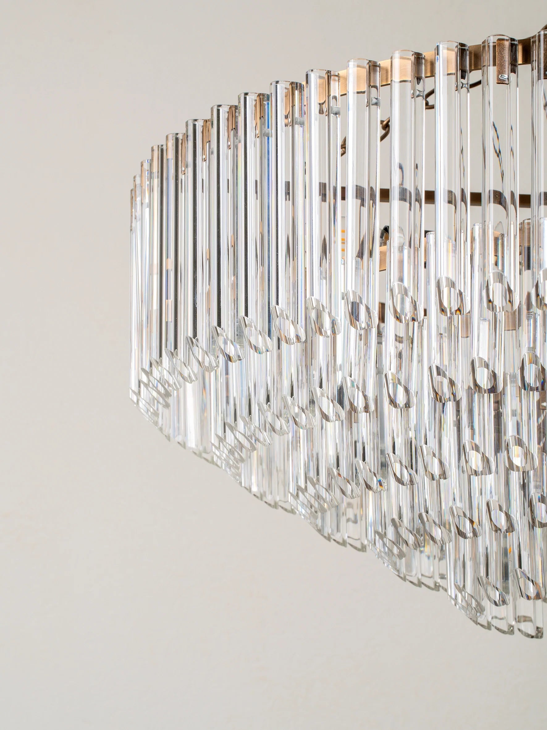 Petalia - 9 light aged brass and clear glass tube wide chandelier