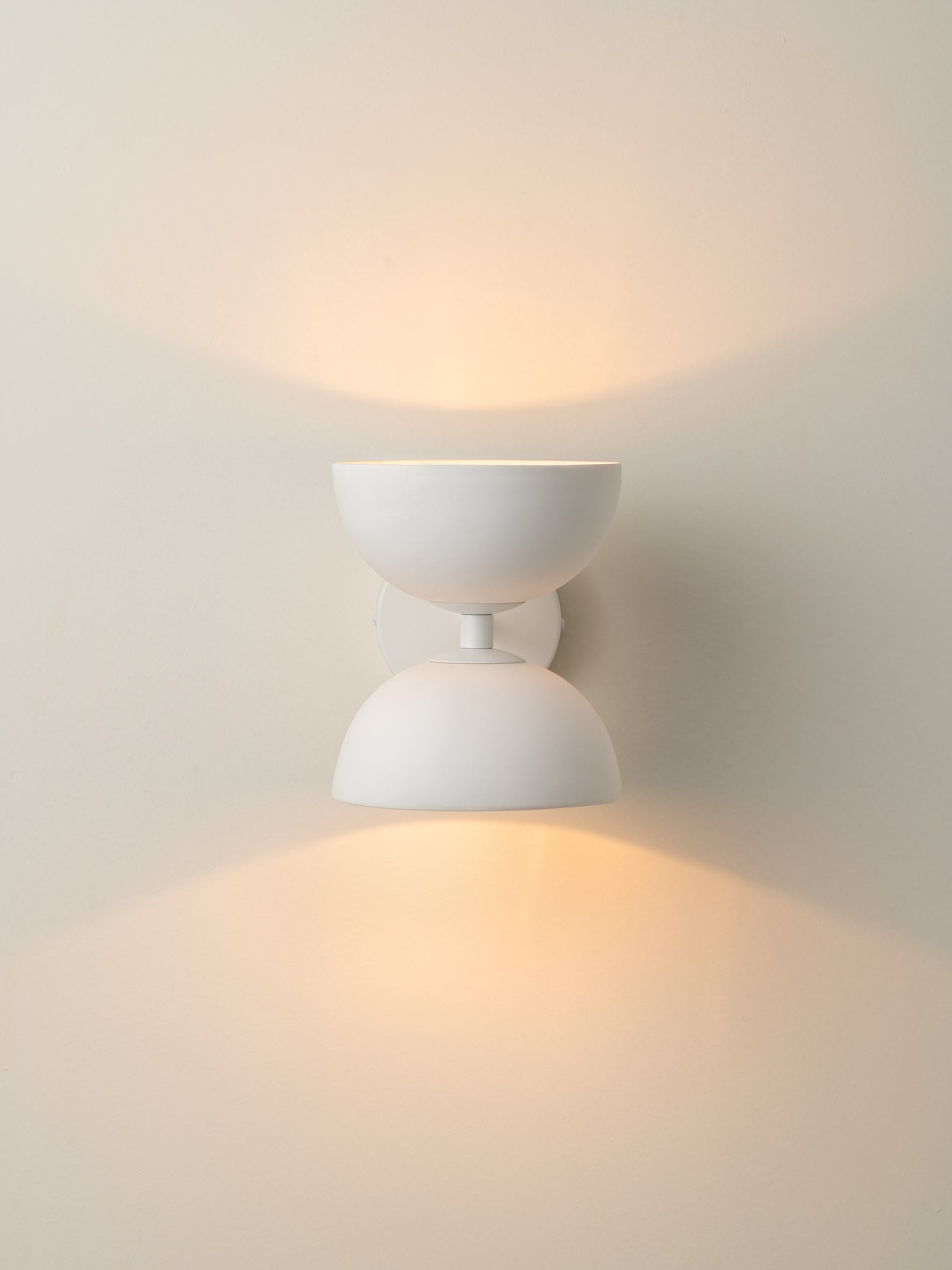 Ruzo - 2 light warm white and porcelain wall light