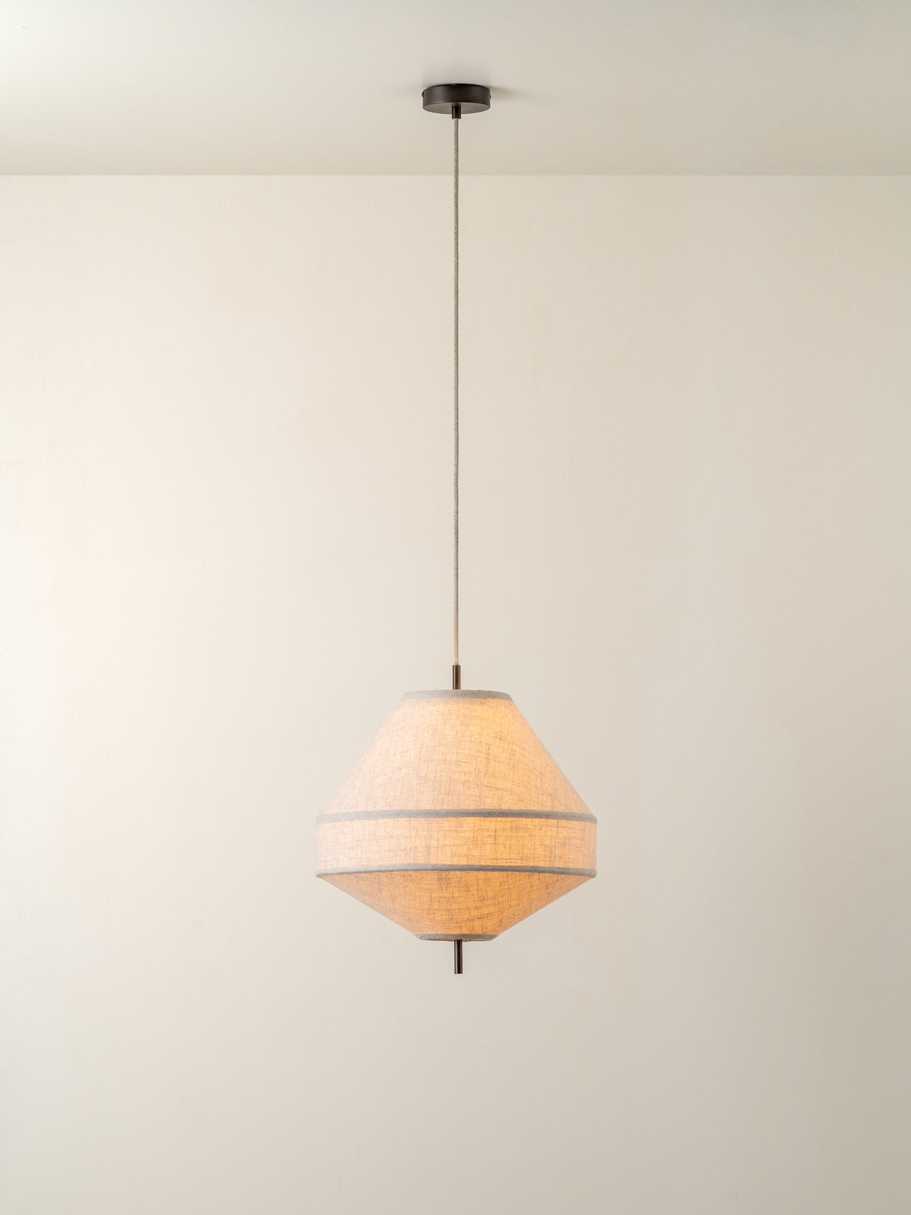 Solara - medium dark bronze and layered natural linen pendant