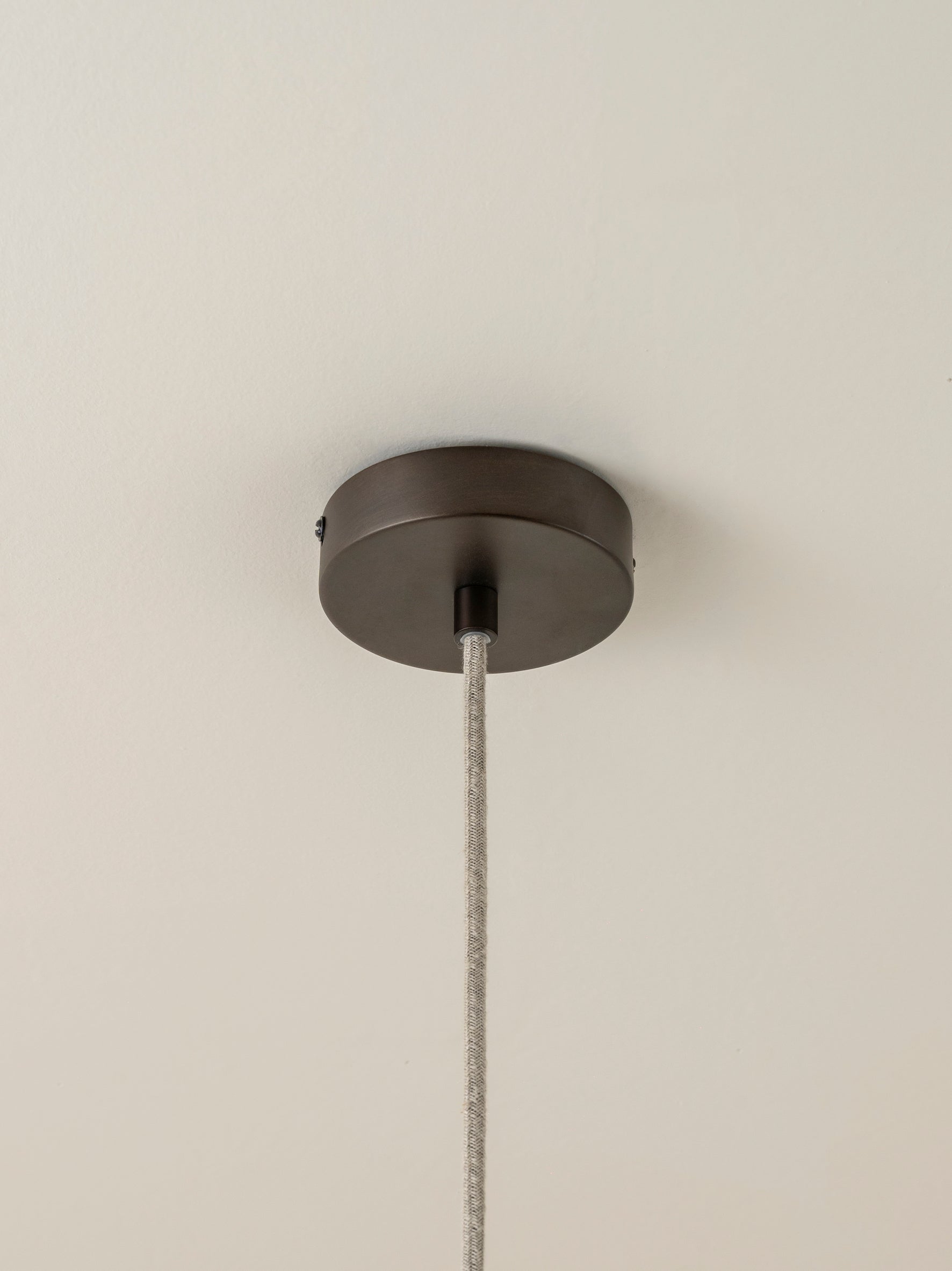 Solara - medium dark bronze and layered natural linen pendant