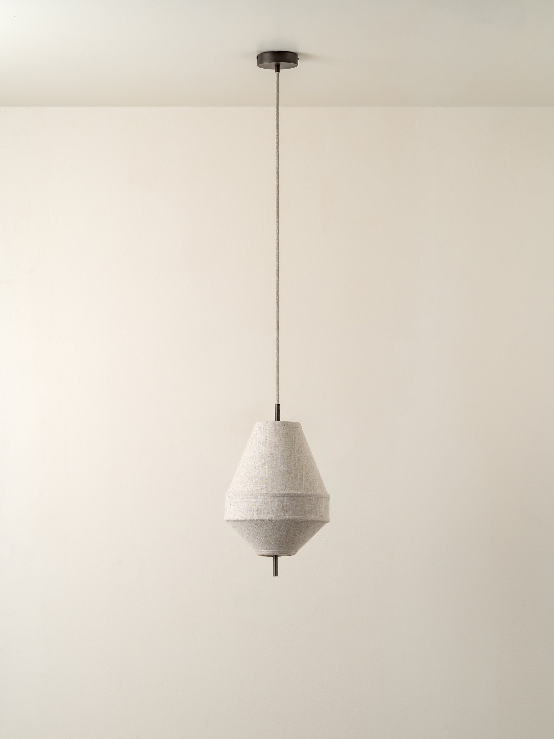 Solara - small dark bronze and layered natural linen pendant