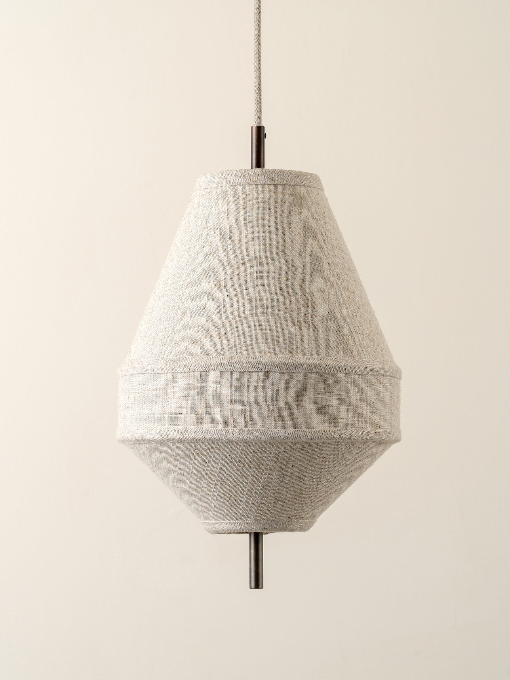 Solara - small dark bronze and layered natural linen pendant