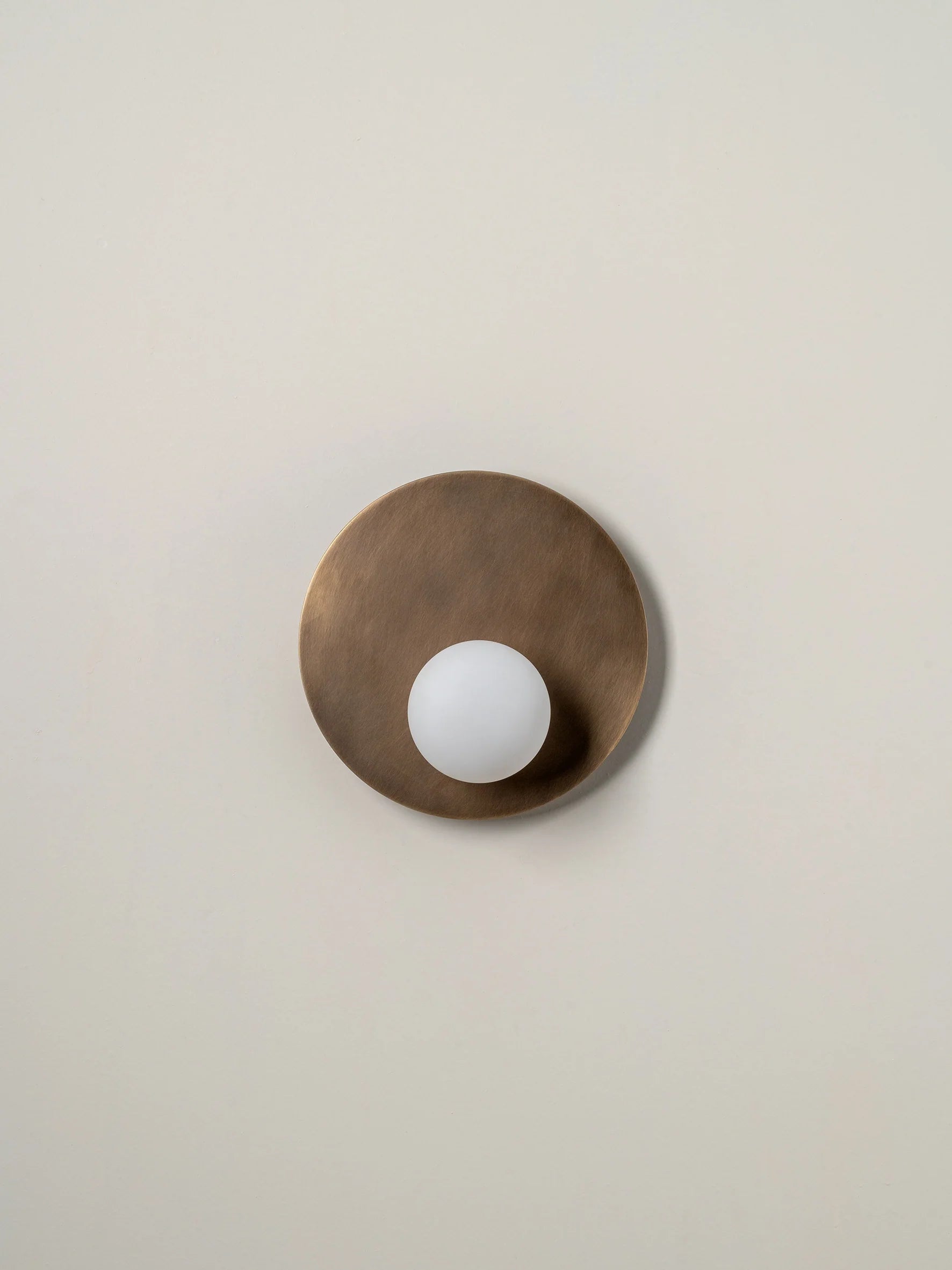 Luna - aged brass and opal disc wall light