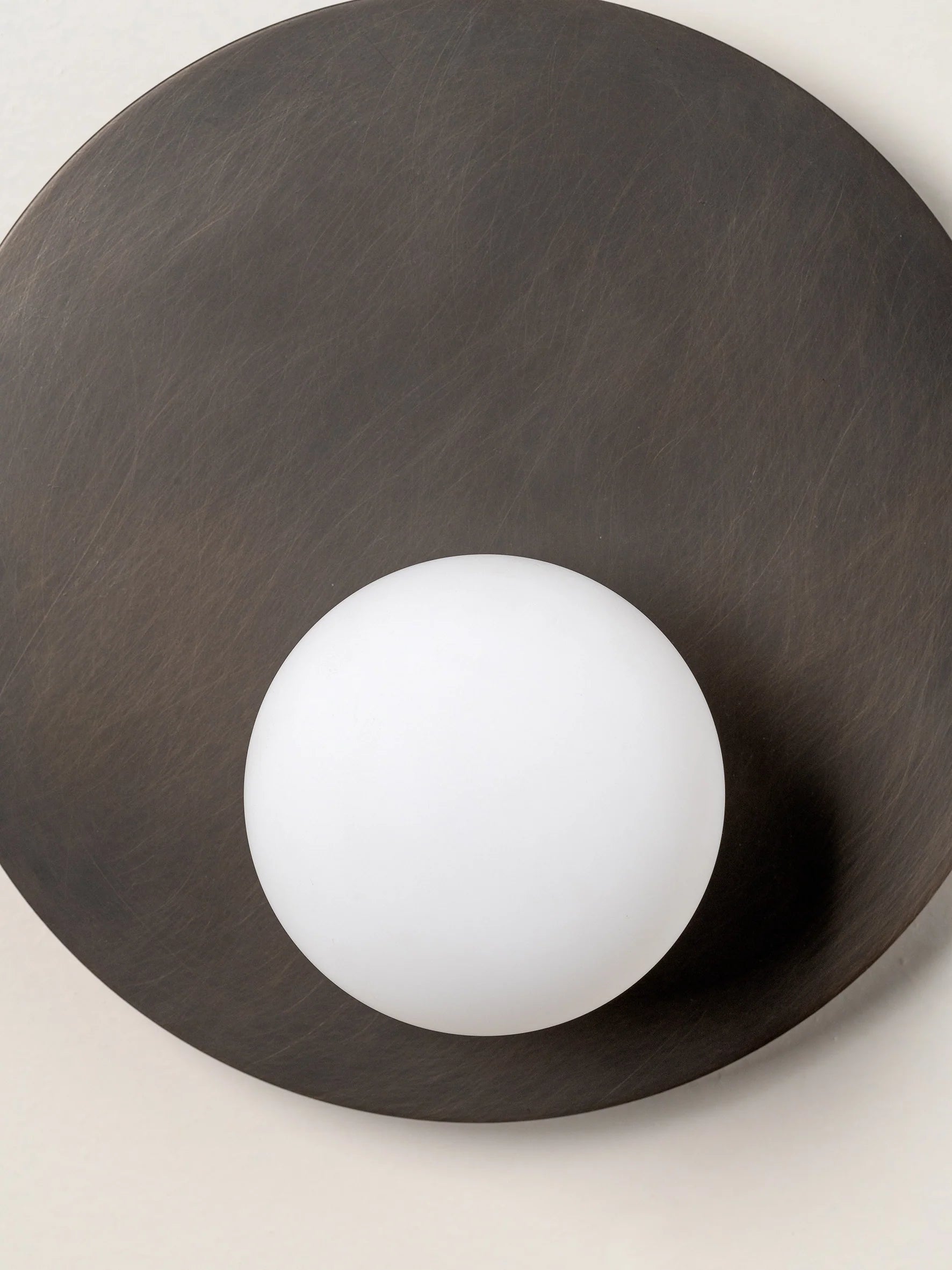 Luna - bronze and opal disc wall light