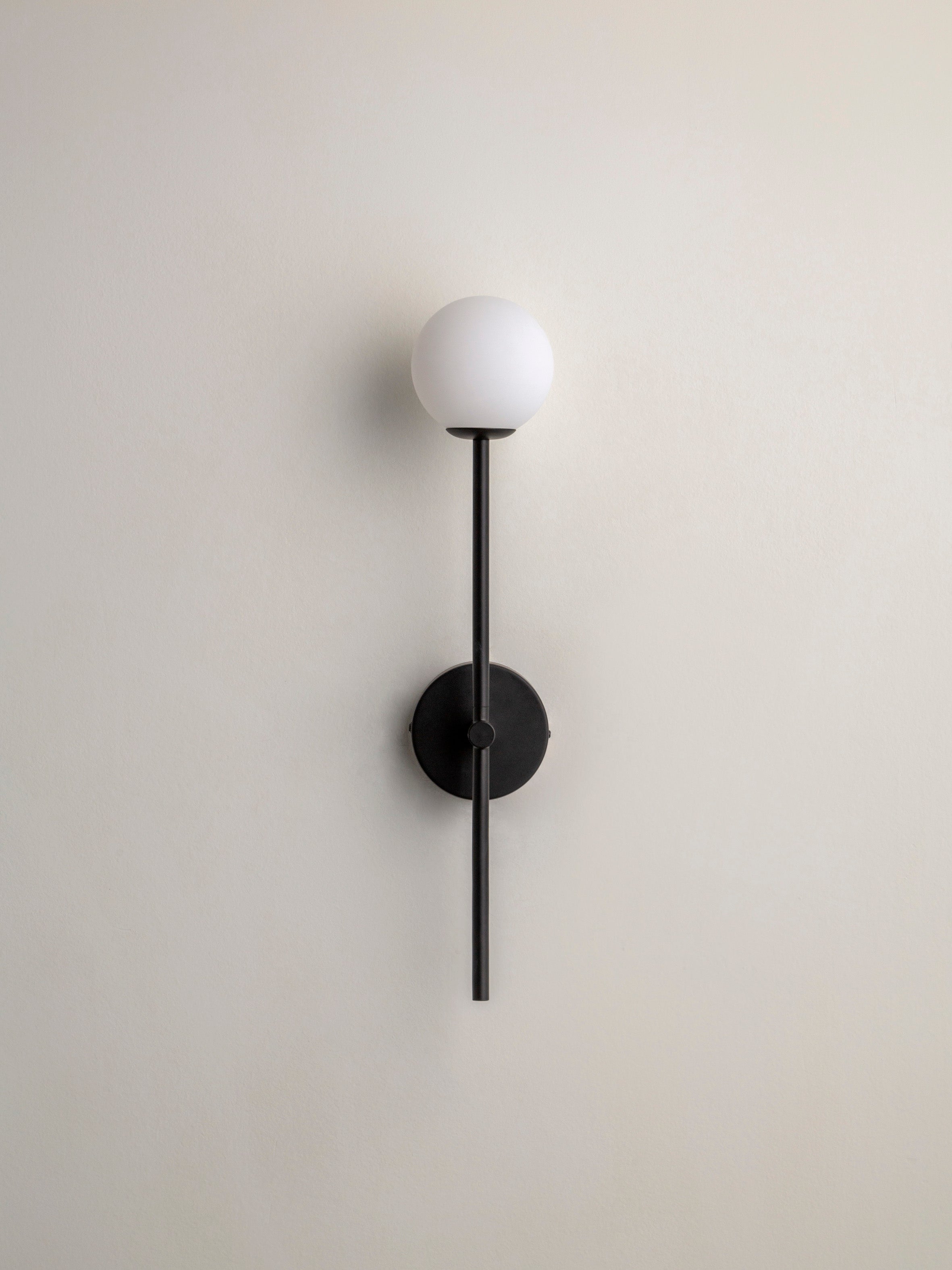 Chelso - matt black and opal wall light