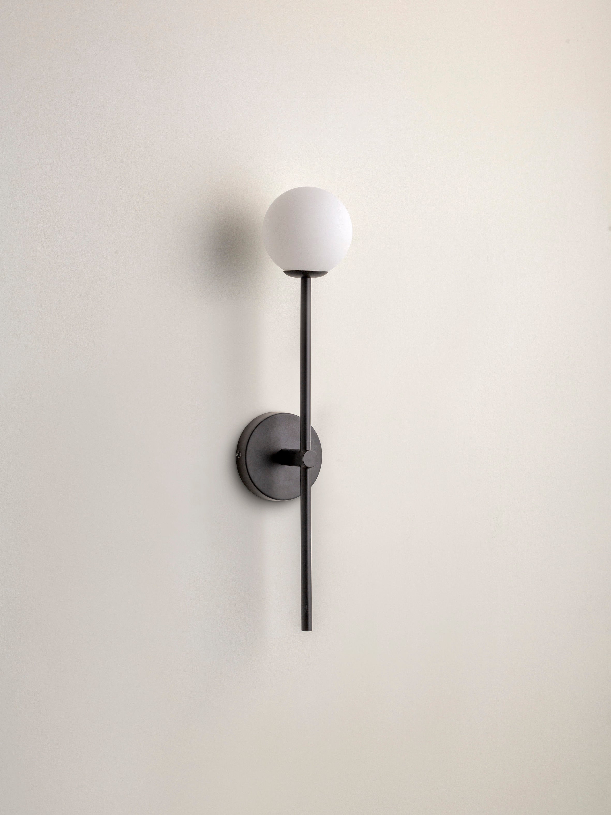 Chelso - matt black and opal wall light